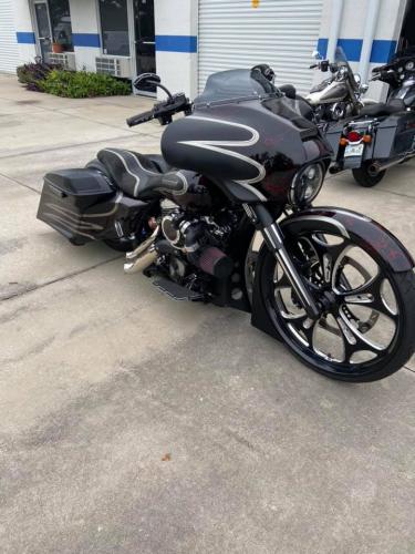 Harley Davidson with custom paint, rims, and tires